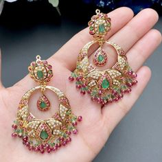 Featuring a bridal choker necklace set made in 22ct gold and embellished with precious rubies, emeralds and pearls Price Breakup Summary Component Rupees % of Total 22k Gold 403,289 76.9% Stones & Beads 33,298 6.3% Making Charges 72,592 13.8% Taxes (GST) 15,275 3.0% Total 524,455 100.0% View Detailed Price Breakup Traditional Gold Chandbali Emerald Necklace, 22k Yellow Gold Emerald Necklace For Wedding, Gold Ruby Chandbalis For Wedding, Green Emerald Necklace In 22k Gold For Wedding, Wedding 22k Gold Emerald Necklace, Emerald Chandbali Temple Jewelry, Gold Chandbali Emerald Necklace For Diwali, Yellow Gold Temple Jewelry Emerald Necklace For Wedding, Yellow Gold Emerald Necklace Temple Jewelry For Wedding