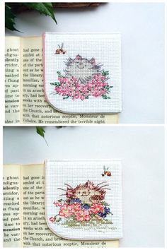 two cross stitched pictures of a cat and flowers on an open book with the same pattern