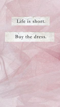 the words life is short, buy the dress on pink and white background with black border