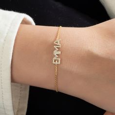 This 14k personalized diamond name bracelet is the perfect gift for the bridal party, someone special, or yourself. * All letters are capital. __________________________________________ M A T E R I A L & L E N G T H Available in 14k Yellow Gold, 14k Rose Gold, 14k White Gold, Sterling Silver Stone: Natural Diamond Thickness: 1.2mm / 0.05" Initials: 6 mm Diamond: 0.15 ct. - 0.40 ct. depending on the name Bracelet length: 6+1 inches (Please let us know if you prefer a different length) Color: G Qu All Letters, Letter Bracelet, Diamond Gift, Gold Diamond Jewelry, Name Bracelet, Special Jewelry, Quality Diamonds, Eternity Bands, Delicate Bracelet