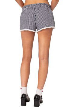 Pleated ruffles trim the hems of these charming cotton shorts covered in smart gingham checks. Elastic waist 100% cotton Machine wash, dry flat Imported Led Fashion, Gingham Shorts, Beauty Sale, Gingham Check, Beauty Trends, Ruffle Trim, Cotton Shorts, Travel Size Products, Gingham