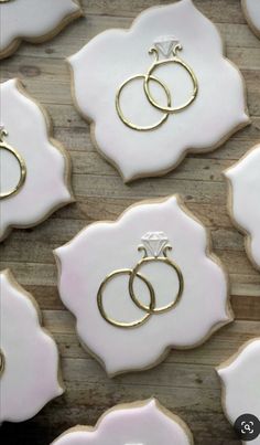 decorated cookies with wedding rings on them