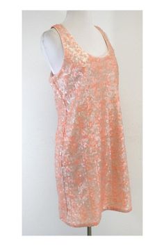 Size 8 Coral & Peach Sequin Tank Dress Shell 100% nylon base 100% polyester sequin Lining 100% acetate Made in USA Scoop neck Silver back zip 1 or 2 missing sequins in back Shoulder to hem 35" Coral Peach, Sequin Tank, Back Shoulder, 1 Or 2, Tank Dress, Flapper Dress, Camisole Top, Made In Usa, Scoop Neck