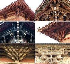 four different angles of an old building with wood carvings on the roof and side walls