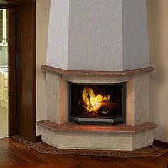 a fire place in the middle of a room