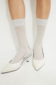 This is a pair of semi-sheer rib knit socks. Features - Calf high - Stretch fabric Materials & Care - 78% Cotton, 9% Polyester, 8% Polyamide, 5% Spandex - Machine wash, cold - Imported Calf High Socks, Knit Socks, High Socks, Knitting Socks, Fabric Material, Rib Knit, Stretch Fabric, Composition, Socks