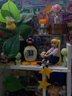 a doll sitting on top of a shelf in a room filled with toys and decorations