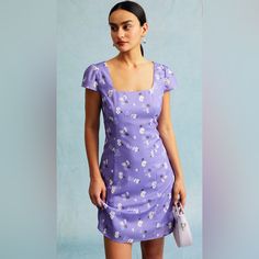 Color: Purple Material: 100% Polyester Details: - A-Line - Cap Sleeve - Square Neck - Short Sleeves - Floral Mini Dress This Cap Sleeve Mini Dress Is A Stunning And Elegant Dress That Is Perfect For Any Occasion. The Square Neck And Cap Sleeve Design Adds A Touch Of Sophistication To The Dress, While The Floral Print Adds A Unique And Eye-Catching Element. The A-Line And Regular Fit Make It Comfortable And Easy To Wear, While Also Creating A Flattering Silhouette That Accentuates The Figure. No Cute Fitted Purple Mini Dress, Purple Floral Tie, Tailored Clothes, Purple Floral Dress, Purple Mini Dresses, Blue And White Dress, Short Sleeve Mini Dress, Mini Sweater Dress, Mini Shirt Dress