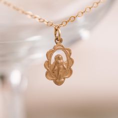 Featuring a stunning floral pattern, our Midi Miraculous Medal Necklace is a medium-sized companion to our Mini Miraculous Medal Necklace and Large Miraculous Medal Necklace. Compared to our original Miraculous Medal Necklace, this piece offers a distinct + intricate design, slightly heavier medal weight, and enhanced overall build quality. Simple and beautiful, the Miraculous Medal Necklace was created to help spread the extraordinary graces offered by this wonderful gift from our Blessed Mothe Dainty Necklace With Miraculous Medal, Elegant Miraculous Medal Necklace, Miraculous Medal Necklace, Saint Necklace, Necklace Extender, Letter Bracelet, Local Jewelry, Miraculous Medal, Broken Chain