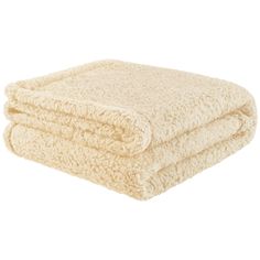 two white towels stacked on top of each other in front of a white background,