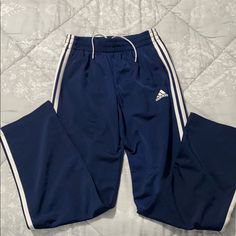 Never Worn Navy Blue With White Stripe Boys Track Pants. Adidas Blue Sweatpants For Sports, Adidas Blue Sporty Sweatpants, Adidas Sporty Blue Sweatpants, Blue Wide Leg Sports Bottoms, Adidas Blue Cotton Pants, Blue Adidas Cotton Sweatpants, Adidas Blue Cotton Sweatpants, Adidas Blue Sweatpants With Pockets, Blue Adidas Sweatpants With Pockets