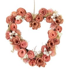 a heart shaped wreath with pink flowers and butterflies hanging from the front, isolated on a white background