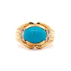 Turquoise & Diamond Cocktail Ring in 14k Yellow Gold This modern statement ring is perfection...Not too big, not too small.  Crafted in 14 karat yellow gold, this partial bezel set cocktail ring features a 2.92 carat cabochon cut turquoise stone accented by a six (6) diamonds with a total weight of .18 carats. Bright and bold, this ring is a stunning addition to any jewelry collection. PRIMARY STONE Stone: Turquoise Shape: Cabochon Weight: 2.92 ct Measurements: 9.95 mm x 7.45 mm x 5.41 mm ACCENT Heirloom Yellow Gold Turquoise Ring For Formal Occasions, Classic Turquoise Ring For Formal Occasions, Classic Formal Turquoise Ring, Formal 14k Gold Turquoise Blue Ring, Formal 14k Gold Turquoise Ring Fine Jewelry, Formal 14k Gold Turquoise Ring, Elegant Turquoise Gemstone Signet Ring, Diamond Cocktail Ring, Diamond Cocktail Rings