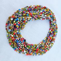 ♕ This Listing is for 20 - 100 Strands of WaistBeads ♕ Wholesale African waist beads. ♕ Ships directly from Ghana, West Africa. ♕ Free shipping via DHL (3 - 5 business days to arrive). ♕ Processing time (5 - 7 business days). ♕ Beads are all TIE-ON (made with cotton thread/polyester). ♕ Length varies from 45 to 50 inches. Multicolor Beaded Chain Waist Beads For Festivals, Multicolor Beaded Waist Chain For Festival, Multicolor Round Beads Waist Chain, Multicolor Large Beads Waist Beads As Gift, Multicolor Large Beads Waist Beads For Gift, Gift Multicolor Waist Beads With Large Beads, Multicolor Beaded Chain Waist Beads, Multicolor Round Beaded Chain Waist Beads, Multicolor Waist Beads For Festival