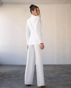 White Tailored Pants For Semi-formal Occasions, Elegant Long Sleeve Stretch Suits, Fitted Wide Leg Set With Pockets, Elegant Stretch Suits, Tailored Tuxedo Sets With Pockets, Chic Tailored Long Sleeve Sets, Spring Formal Trousers Sets, Elegant Wide-leg Sets With Pockets, Fitted Trousers Sets With Pockets