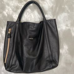 17” Wide X 14” X 3” Base. Beautiful, Gently Used Condition. A Few Little Marks On The Black Lining But Could Probably Be Cleaned Off. No Call Outs On The Outside. Gorgeous Bag, With Lots Of Space, Zip Pockets Inside And Out. Modern Large Black Satchel, Large Black Everyday Satchel, Large Chic Black Satchel, Large Black Bags With Leather Handles, Large Black Shoulder Bag With Leather Handles, Large Black Satchel For Everyday Use, Large Black Shoulder Bag With Removable Pouch, Black Hobo Bag With Detachable Handle For Business, Large Black Bag With Removable Pouch