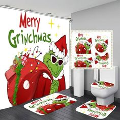 a bathroom decorated for christmas with the grin on it's toilet and rugs