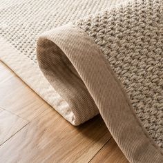 a close up view of a rug on the floor