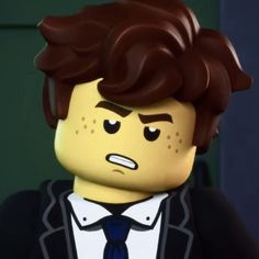 a lego man wearing a suit and tie