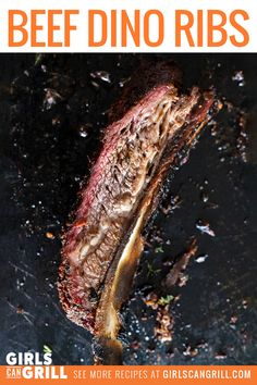 a steak is being cooked on a grill with the words beef dino ribs above it