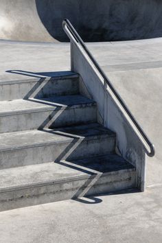 a person riding a skateboard down some stairs