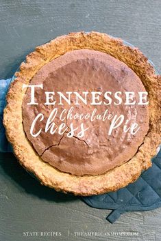 a chocolate pie with the words tennessee cheese pie written in white lettering on it's crust