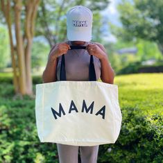 The Mama Canvas Tote is a stylish and durable everyday bag. It is made from canvas fabric and features an eye-catching MAMA design printed in a nice font. Perfectly sized for a variety of errands, it's the ideal choice for shopping, a light weekend away, and more. One side printing, spacious inside and no pockets Dimensions: approximately 19” x 16” x 6” Ethically sourced, reusable, recyclable, no plastic packaging Machine washable cold gentle cycle and hang dry Made in China Mama Design, Jewelry Roll, Baby Bundles, Hair Setting, Charity Shop, Mom Day, Proud Mom, Trendy Tote, Donate To Charity