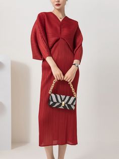 Make a bold and confident statement with this Batwing Sleeve V-Neck dress! With soft, easy-to-wear material and the ability to layer, you’ll be able to wear this dress all year round! Chic Maxi Dress With Notched Neckline, Chic Red V-neck Maxi Dress, Chic Red Maxi V-neck Dress, Batwing Sleeve, V Neck Dress, Bat Wings, Neck Dress, V Neck, Dresses