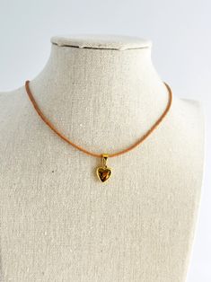 "*This Handmade Leather necklace made with 2mm premium Genuine round leather cord. Gold Heart Pendant is Stainless Steel. *Genuine Leather little Stiff in Shape. *Each necklace features a matching lobster clasp and 2\" chain Extension. *Choose your necklace length.  *This necklace is fun and easy to wear. It also makes a great gift idea." Heart-shaped Leather Jewelry For Gifts, Heart-shaped Leather Jewelry Gift, Adjustable Brown Jewelry With Heart Charm, Adjustable Gold Heart Choker, Handmade Waxed Cord Necklace For Everyday, Leather Necklace With Adjustable Cord For Gift, Leather Necklace With Adjustable Cord As Gift, Adjustable Handmade Gold Heart Necklace, Adjustable Gold Choker With Heart Charm