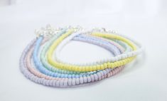 Pastel Seed Bead Bracelet * SELECT ONE * Kawaii Pastel Bracelet * Pastel Beaded Bracelet  * Pastel Rainbow Bracelet * Pastel Aesthetic Bracelet length 6 - 8 inches. If you want these are anklets please click here: https://www.etsy.com/uk/listing/993958521/pastel-seed-bead-anklet-select-one This is a minimal pastel bracelet, A lightweight & delicate bracelet and perfect for everyday wear.  Perfect as Birthday, Christmas and Friendship presents. If you have any questions about these bracelets, con Handmade Adjustable Pastel Beaded Bracelets, Adjustable Pastel Bracelets With Round Beads, Handmade Adjustable Friendship Bracelets In Pastel, Adjustable Pastel Beaded Bracelet, Handmade Pastel Bracelets For Friendship, Seed Bead Anklet, Friendship Presents, Blue Anklet, Pastel Bracelet