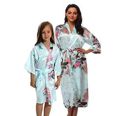 Stylish and trendy Mommy and Me Robes for women and girls These robes are great for any occasion, whether for daily use, travel, spa parties, wedding, vacation and more Kids love dressing up like mommy, and its a great opportunity to share something special with your daughter, niece, goddaughter, granddaughter, sister and more Available for women in regular or plus sizes, from sizes 2 to 38, and for child from 2T to 14. Please use our specific size chart to get a great fit Robes feature a floral Womens Robes Long, Spa Robes, Nursing Robe, Pink Concert, Baby Girl Swaddle, Robes For Women, Satin Robes, Plus Size Robes, Couple Pajamas