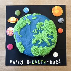 a birthday cake made to look like the earth