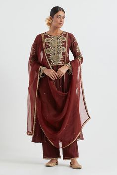 Maroon anarkali featuring hand embroidered yoke with gota detailing. Paired with a pant and a dupatta. - Aza Fashions Festive Unstitched Anarkali Set With Resham Embroidery, Transitional Reception Salwar Kameez With Zari Work, Festive Salwar Kameez With Zari Work For Reception, Festive Resham Embroidered Anarkali Set, Anarkali Style Sharara With Zari Work For Reception, Festive Resham Embroidery Anarkali Set, Unstitched Anarkali Set With Zari Work For Reception, Dabka Work Anarkali Set For Reception, Anarkali Set With Dabka Work For Reception