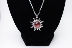 Stunning Strawberry Quartz Sun 925 sterling silver necklace. This elegant dainty beauty is paired with a 925-sterling silver chain. Strawberry Quartz is a silicate and has a hardness of 7 on the Mohs scale. It is trigonal in its crystalline structure. The chemical composition of this stone is silicon dioxide with Hematite inclusions. Spiritual Silver Jewelry Gift For Mom, Handmade Silver Necklace For Mom, Handmade Silver Necklace As Gift For Mom, Sterling Silver Necklace Stamped 925 As Gift For Mom, Spiritual Sterling Silver Hypoallergenic Necklace, Spiritual Hypoallergenic Sterling Silver Necklace, Hypoallergenic Sterling Silver Spiritual Necklace, Silver Pendant Necklace For Mom, Silver Pendant Necklace As Gift For Mom