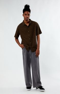 Add a touch of laid-back sophistication with the Santiago Brown Camp Shirt from PacSun. This shirt features a collared neckline, short sleeves, and a relaxed fit for easy comfort. Perfect for casual outings or lounging, it's a versatile staple for your wardrobe


	Collared neckline
	Short sleeves
	Button closures
	Custom pattern
	Relaxed fit
	96% Cotton, 4% spandex
	Machine washable
	Model is wearing size medium
	Model Measurements: 6'1” Height, 31” Waist, 32” Inseam Cheap Brown Cotton Camp Shirt, Brown Retro Short Sleeve Camp Shirt, Brown Relaxed Fit Collared Camp Shirt, Brown Relaxed Fit Button-up Camp Shirt, Brown Printed Camp Collar Shirt, Camping Shirt, Public Relations, Exclusive Collection, Pacsun