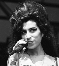 black and white photograph of a woman talking on a cell phone