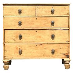 an old wooden chest of drawers with metal knobs on the top and bottom, isolated against a white background