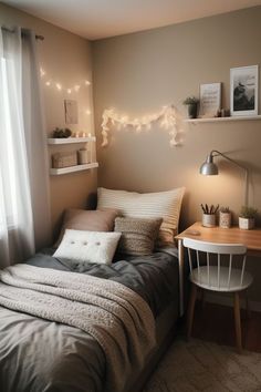 a small bedroom with a bed, desk and shelves on the wall next to it