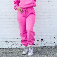 Experience the perfect balance of comfort and style with our Pink Sweatpants, available in sizes S to 5XL. Designed for a relaxed yet flattering fit, these sweatpants are ideal for lounging, running errands, or casual everyday wear. Ultimate Comfort: Crafted from a buttery soft, cotton-blend fabric, these sweatpants offer all-day comfort. The relaxed fit ensures freedom of movement, making them your go-to for both relaxation and activity. Features: Equipped with a thick elastic waistband and adj Sporty Lounging Pants, Solid Ankle-length Athleisure Joggers, Spring Sweatpants With Elastic Cuffs For Lounging, Trendy Solid Color Joggers For Loungewear, Fall Loungewear Sweatpants With Loosely Fitted Hips, Trendy Joggers With Ribbed Waistband For Loungewear, Trendy Leisure Joggers With Elastic Cuffs, Casual Pants With Ribbed Cuffs For Loungewear, Spring Basic Relaxed Fit Joggers