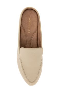 An almond-shaped moc toe adds classic polish to a loafer-inspired mule with a shock-absorbing sole. Synthetic upper, lining and sole Imported Classic Beige Slip-ons With Cushioned Footbed, Almond Shaped, Mule, Nordstrom Rack, Almond, Loafers, Nordstrom