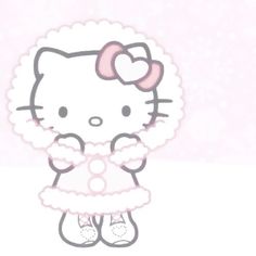 the hello kitty is wearing a pink dress