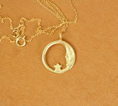 Moon necklace - sun moon and star - moon and star necklace - a gold vermeil moon and star hoop hanging on a 14k gold vermeil chain A peaceful and pretty gold vermeil moon and star charm hanging happily from a 16 inch 14k gold vermeil chain. Please feel free to select a different length chain if you prefer! The moon measures: 16mm across. More from BubuRuby? https://www.etsy.com/shop/BubuRuby?ref=hdr_shop_menu Want to see more gems? http://www.etsy.com/shop/BubuRuby?section_id=12672242 More Druzi 14k Gold Star-shaped Moon Charm Jewelry, 14k Gold Moon Charm Star Jewelry, 14k Gold Star-shaped Jewelry With Moon Charm, 14k Gold Star Jewelry With Moon Charm, Gold-plated Star Jewelry With Moon Charm, Yellow Gold Moon Necklaces With Star Charm, Moon And Star Necklace, Necklace Sun, Girl Things