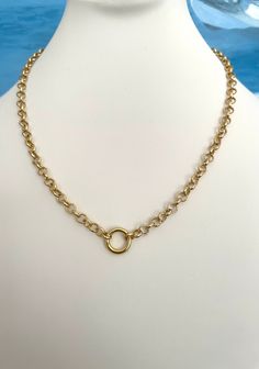 FREE SHIPPING! 18k Gold Filled Rolo Chain Necklace with Snap Ring Charm Holder  Ring opens allowing you to wear with charm of your choice. All charms in my shop are available for purchase.  Available in your choice of custom length with 2 inch extender.  5mm Rolo chain.  Lobster clasp Stunning! To keep your jewelry in excellent condition: 1) Avoid contact with water, perfume and lotion. 2) Remove during physical activities. 3) Store separately in an airtight box, plastic bag or soft pouch 4) Rem Gold Circular Jewelry With Cable Chain, Gold Plated Rolo Chain Jewelry, Gold-tone Jewelry With Rolo Chain, 14k Gold Round Charm Necklaces, Metal Charm Necklaces With Gold Chain, Gold Circular Charm Necklace With Adjustable Chain, Gold Plated Rolo Chain Link Jewelry, Everyday Rolo Chain Jewelry, Everyday Round Rolo Chain Jewelry