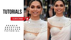 two women in white dresses with pearls on them