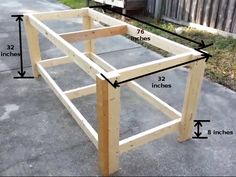 an image of a wooden table with measurements for the top and bottom sections on it