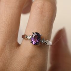 All HANDMADE ITEMS SHIP IN APPROX 8 DAYS Main Stone: Real natural amethyst Main Stone Size: Oval cut 6 mm x 8 mm Main Stone Weight: 1.19 carat Side Stone: CZ Height From The Ring Setting Bottom(to gemstone top): about 5.24 mm Width of Ring band Measure: gradually varied,about 2.14 to 2.99 mm Material: 925 Sterling Silver/14K White Gold/14K Yellow Gold/14k Rose Gold Engraved: Available For FreeNo more than 13 letters) Customized:Of course! Tell me what you want Includes With Order: All of my stor White Gold Amethyst Birthstone Ring With Prong Setting, Amethyst Solitaire Birthstone Ring For Anniversary, Round Amethyst Ring With Diamond Cut, White Gold Amethyst Ring As A Gift, White Gold Amethyst Birthstone Ring With Center Stone, White Gold Amethyst Ring Gift, Amethyst White Gold Ring Gift, Amethyst Birthstone Ring In White Gold, Purple Solitaire Amethyst Birthstone Ring