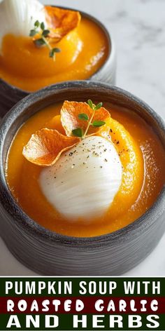 pumpkin soup with roasted garlic and herbs in a bowl on a marble countertop, with text overlay reading pumpkin soup with roasted garlic and herbs