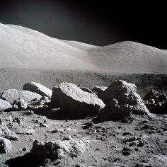 an image of rocks and mountains in the desert with dark sky above it, as seen by nasa's opportunity rover curiosity