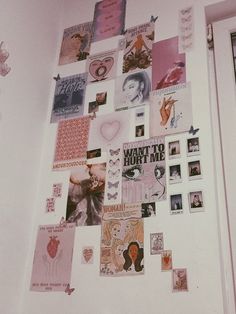 a white refrigerator covered in lots of magnets and pictures