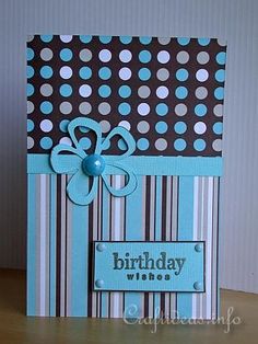 a blue and brown birthday card with polka dots